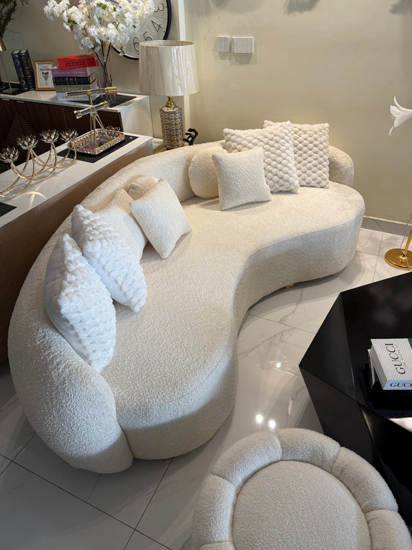 White boucle curved sofa